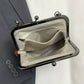 Vintage Handtas met Beugelsluiting en Retro Design